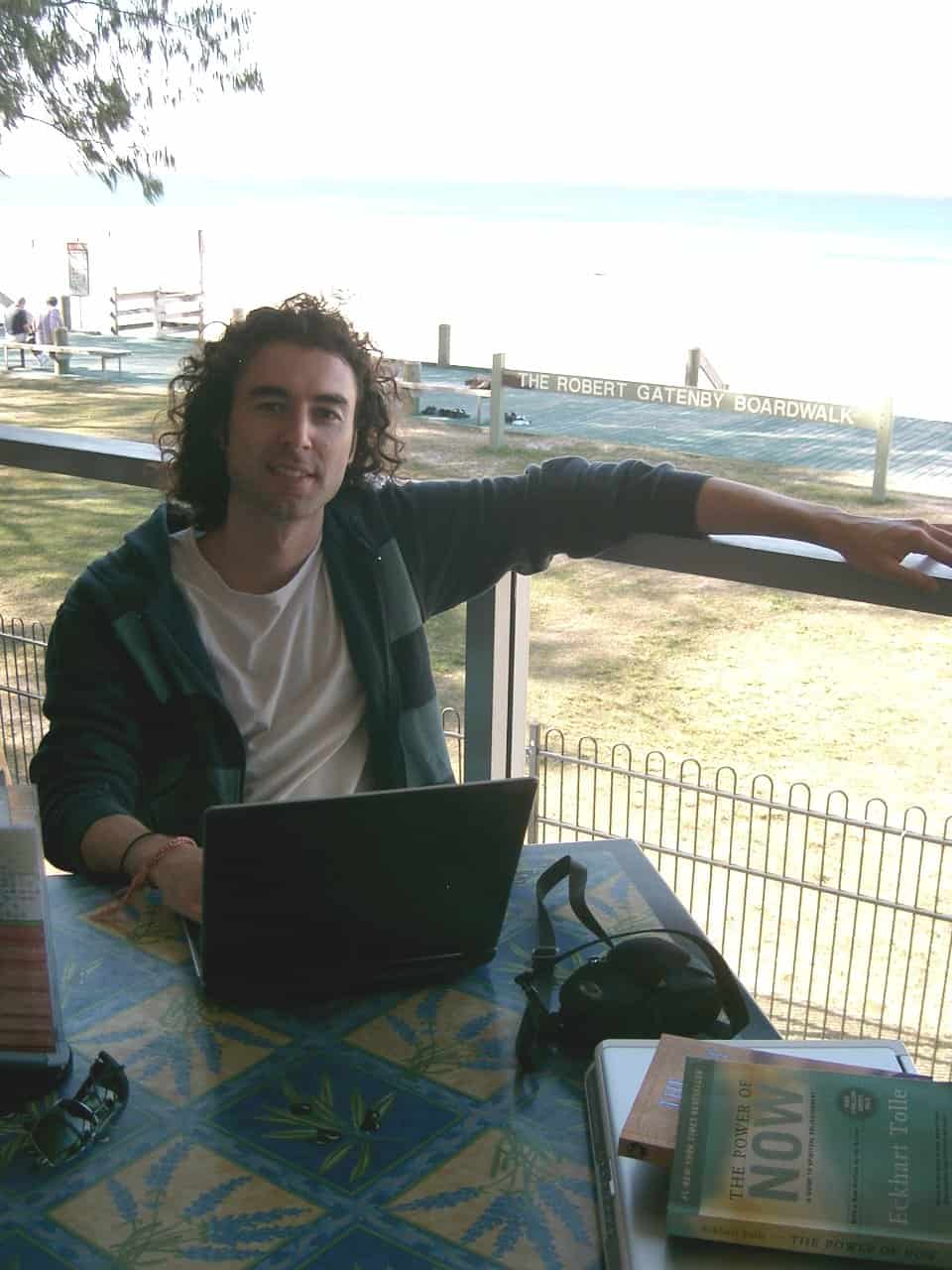 Yaro at 25 on the beach in Australia